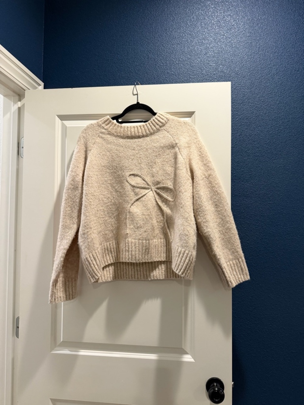Cozy Cream Bow-Detail Crewneck Sweater